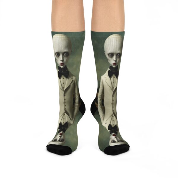 Socks with a creepy bald person on them.